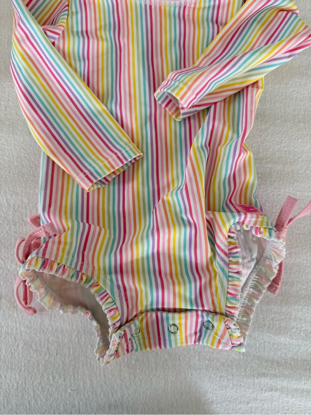 Ruffle Butts Pastel Rainbow Stripe One-Piece with Pink Trim